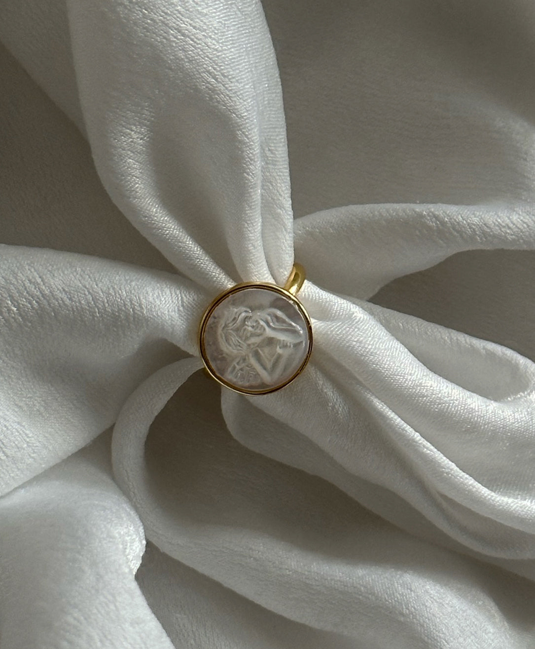 Cherub Embossed Circle Ring