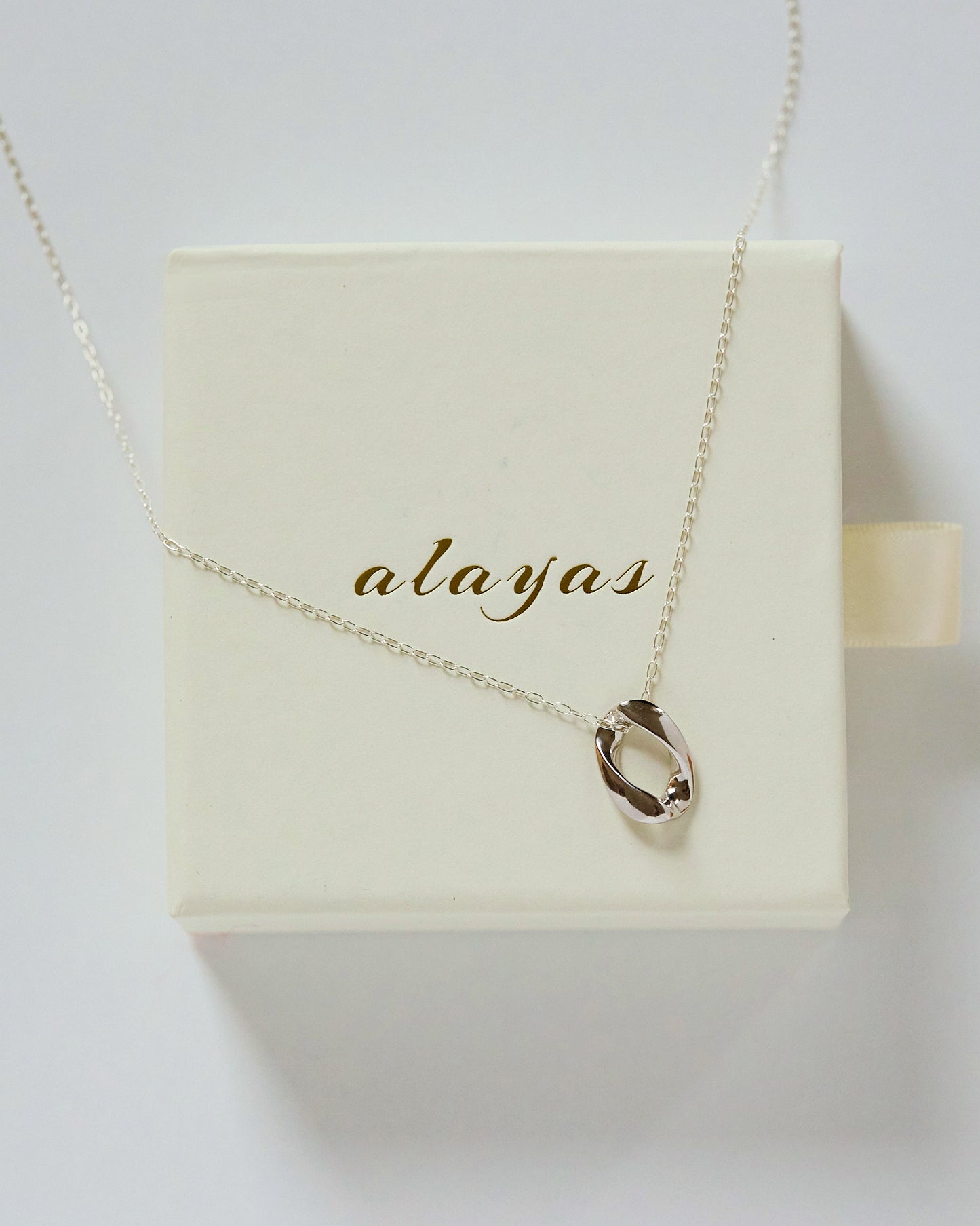 Möbius Twist Pendant (30" chain)